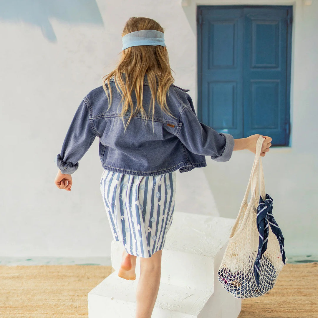 Shortened medium blue denim shirt jacket