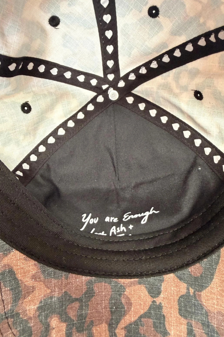 SABBI THE WHO THE BUCK CARES CAP