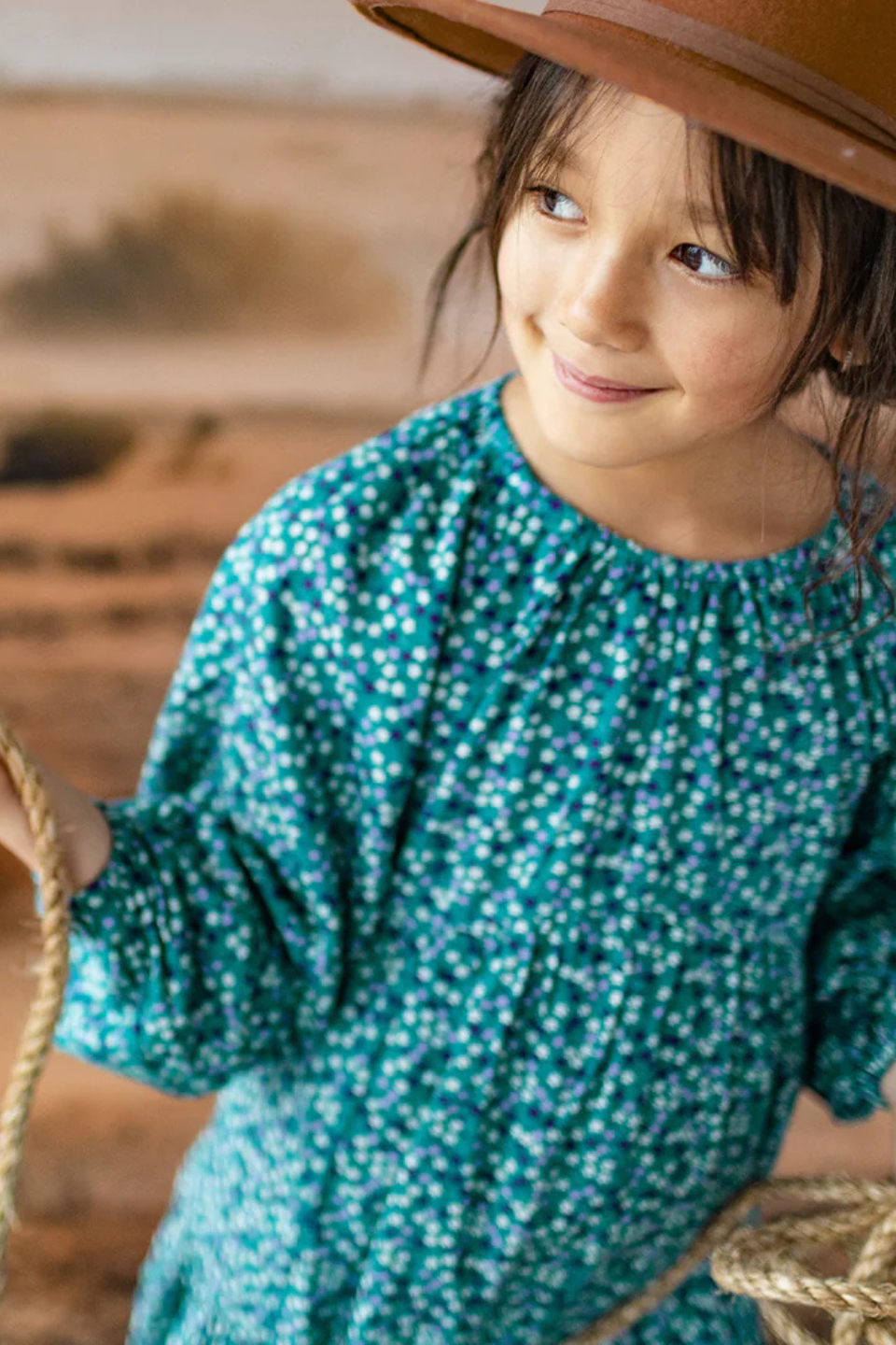 Turquoise dress with floral pattern