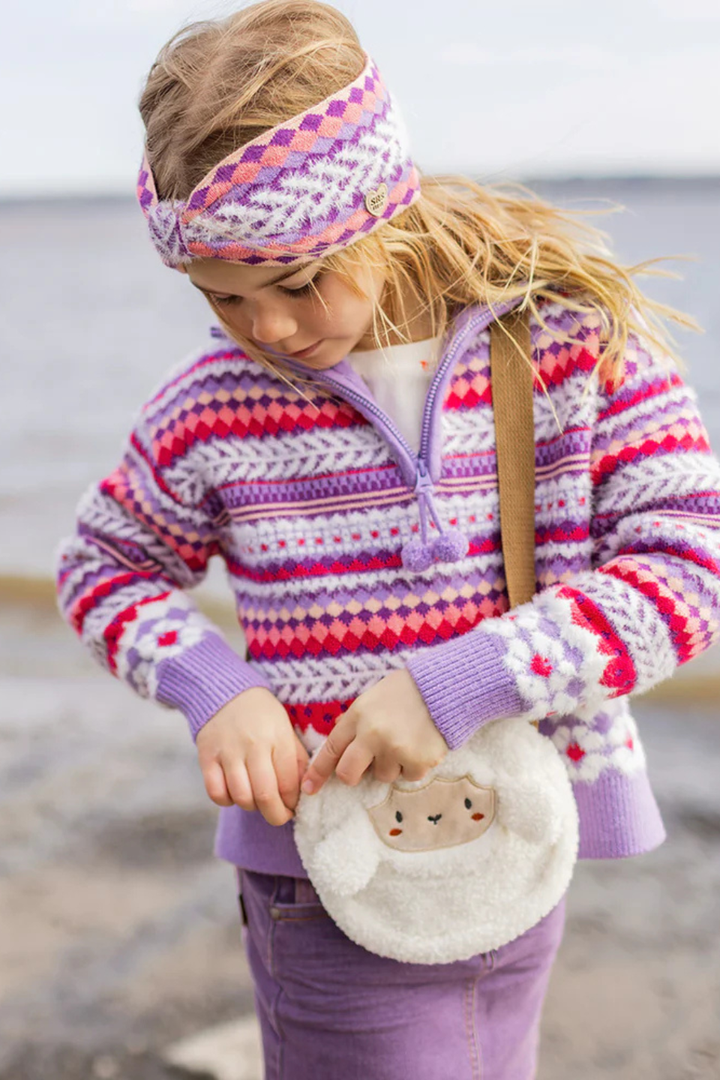 Purple knit sweater with patterns