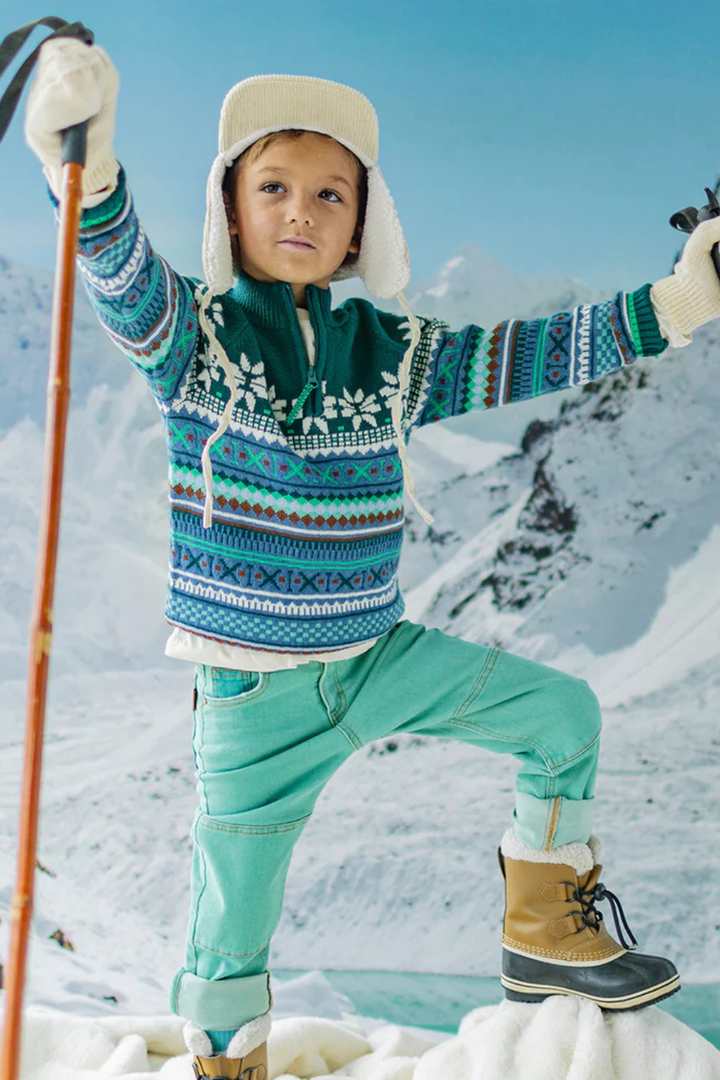 Teal knit sweater with patterns
