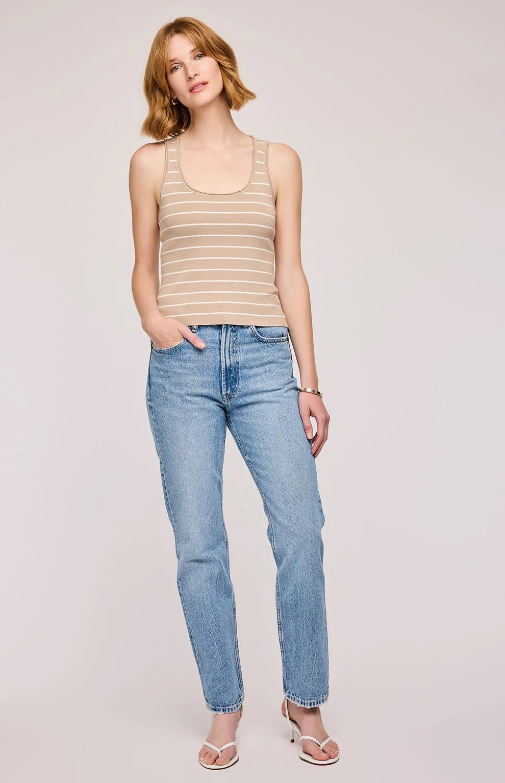 Beige and white striped tank top with fitted silhouette