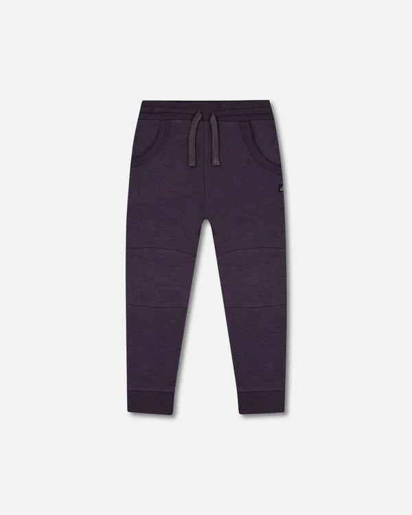Drawstring waist joggers, Scoop pockets, Stitched knee pads