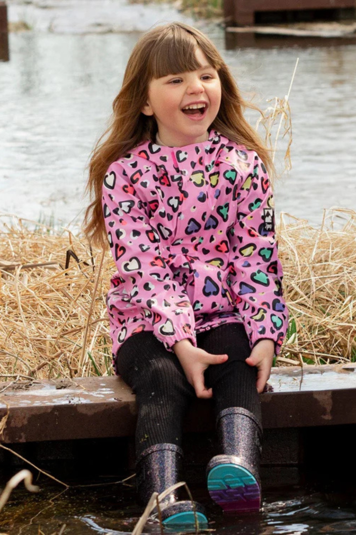 Pink raincoat with color-changing hearts