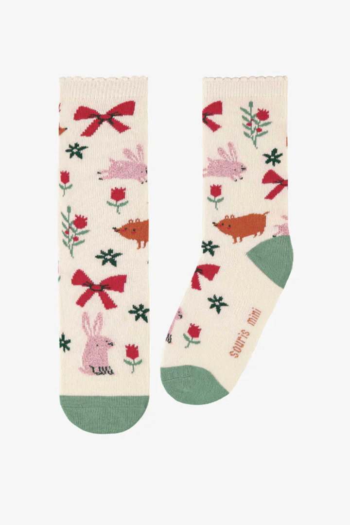 Cream socks with festive patterns